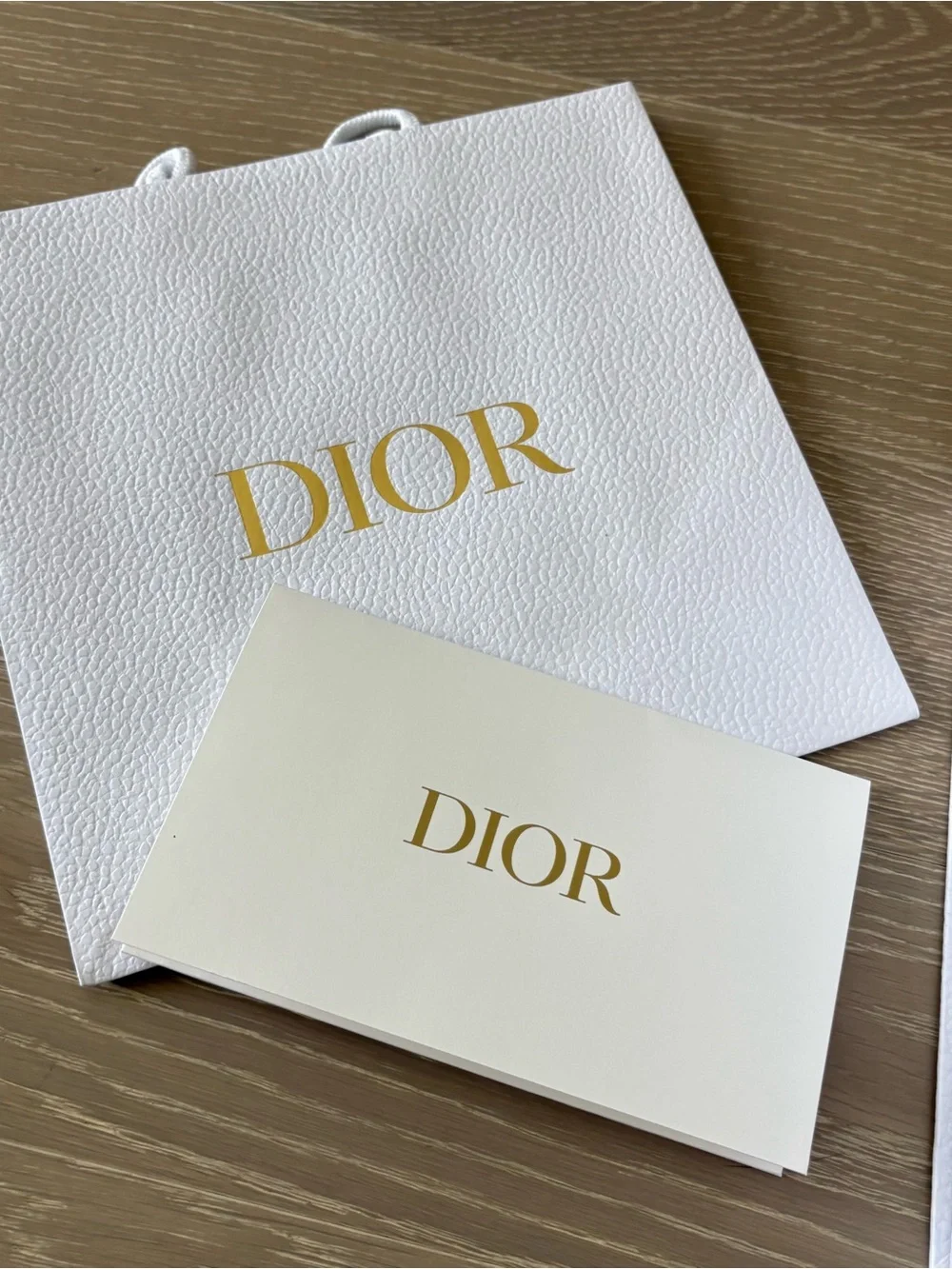 Dior gift box and bag with logo ribbon